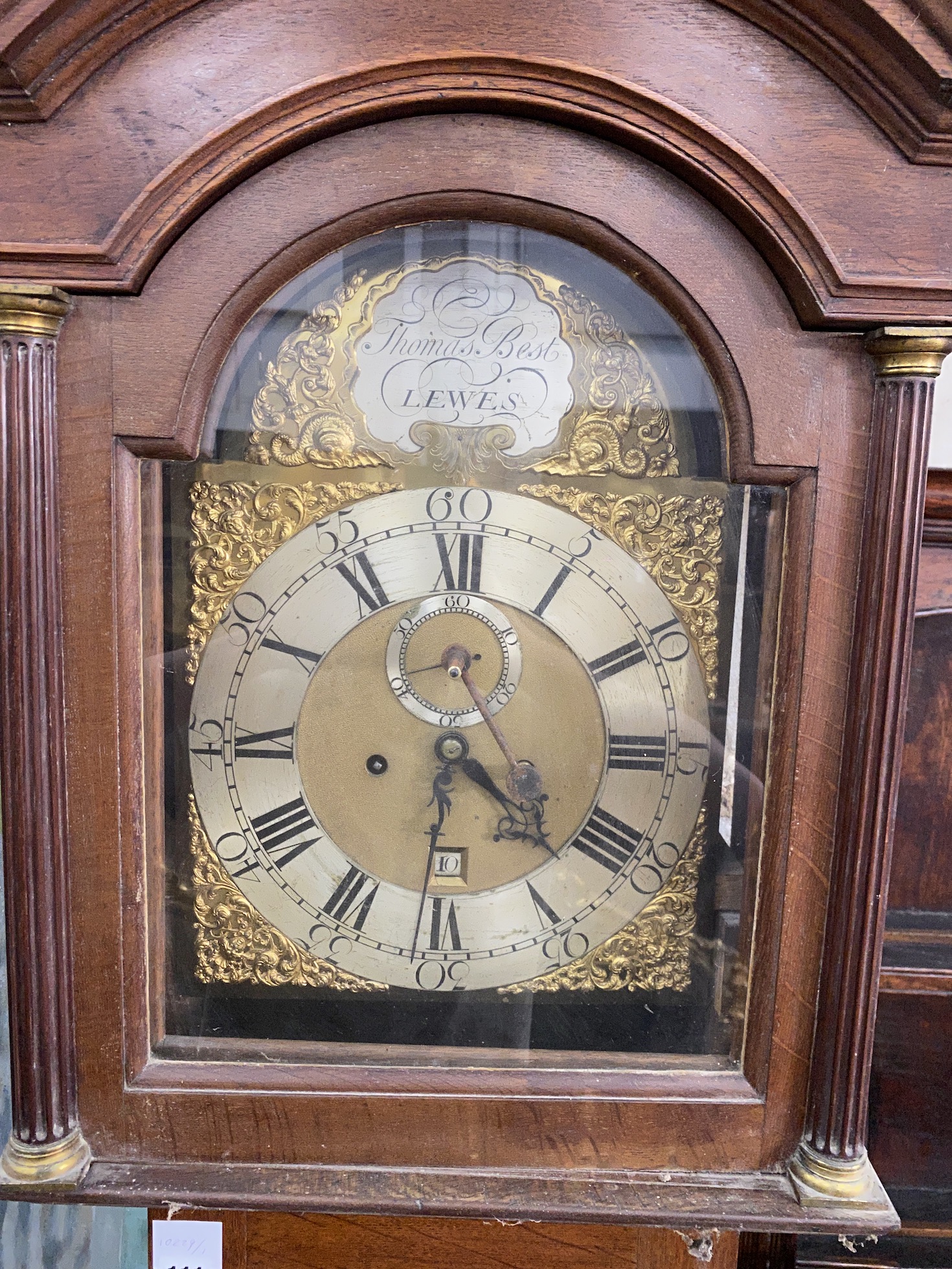 An early 19th century inlaid oak eight day longcase clock by Thomas Best, Lewes (no weights), height 211cm